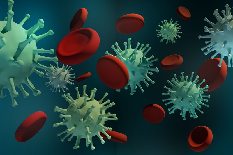 3D render of green COVID virus particles and red blood cells against dark teal backdrop