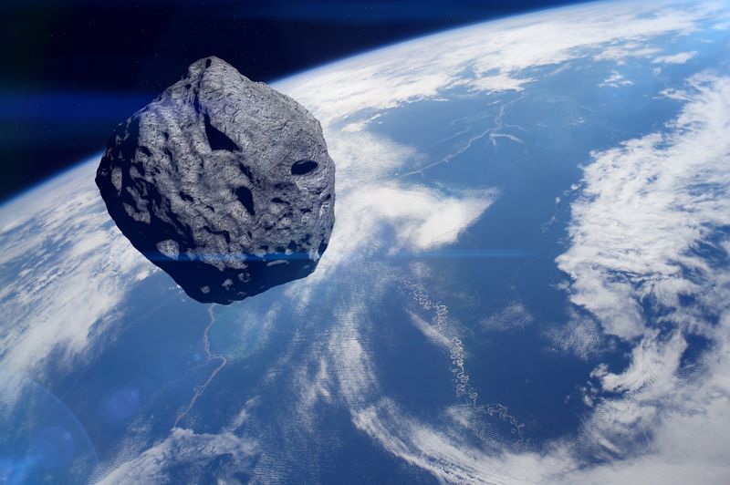 a 3-D RENDERING OF AN ASTEROID IN SPACE APPROACHING EARTH