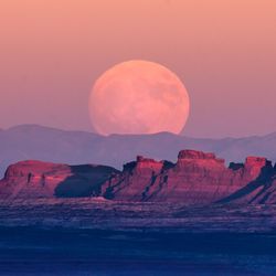 Full Moon rises over Monument Valley on Navajo Tribal Land on the Utah/Arizona border