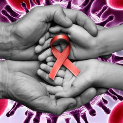 hands holding red HIV awareness ribbon against a backdrop showing retrovirus particles and blood cells