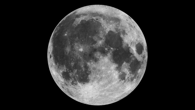 The near side of the Moon with its dark maria and lighter colored highlands is seen in this photo