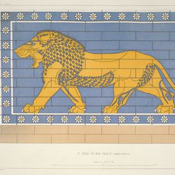 A photo of one of the Assyrian symbols representing a lion on a brick wall. The lion is yellow and facing the left. It is depicted astride and has it mouth open. The stones surrounding it painted blue and there are flowers painted in the margins surrounding it. 