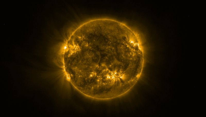 An image of the Sun in uv light. the surface is mostly dark but thewre are some prighty swipsy regions like the one crucial to this story where things are happening