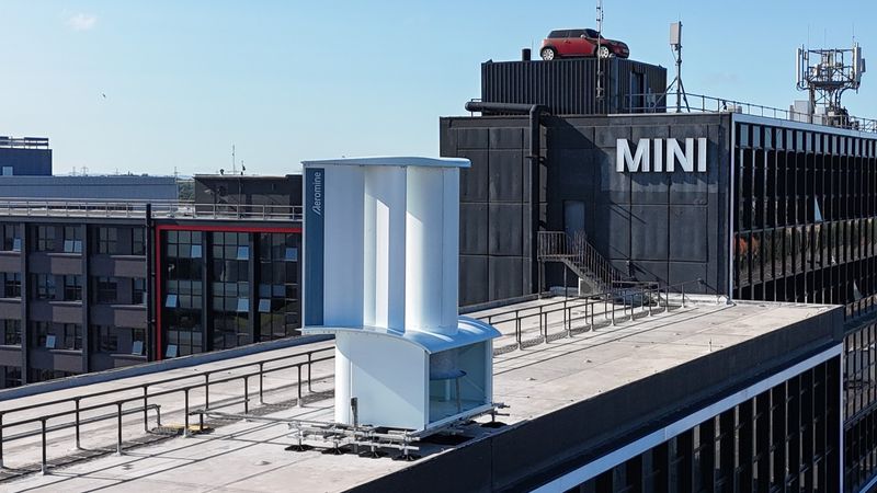 motionless wind turbine on the roof of Plant Oxford