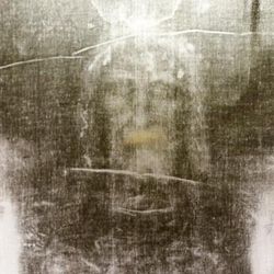 An X-ray image of the Turin Shroud showing the imprint of a male face. 