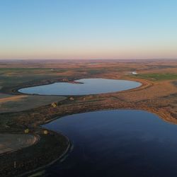 drone photograph of two prairie potholes