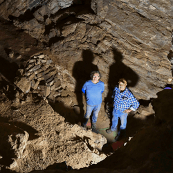 GunaiKurnai Elder Uncle Russell Mullett and Monash University's Professor Bruno David in Cloggs cave where evidence of the oldest continuously practiced ritual in the world has been found.