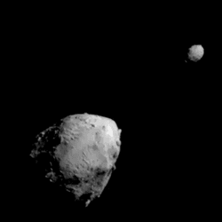 The two asteroids are visible in this image. Disymos appears to have a few boulders and several smooth areas dimorphos is much smaller and further away but looks more ragged.