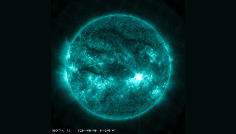 NASA’s Solar Dynamics Observatory captured this image of a solar flare – as seen in the bright flash on the right – on August 8, 2024. The image shows a subset of extreme ultraviolet light that highlights the extremely hot material in flares and which is colorized in teal