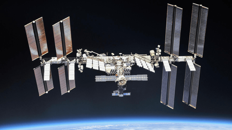 The International Space Station above the Earth.