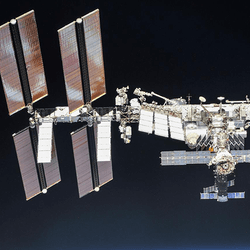 The International Space Station above the Earth.