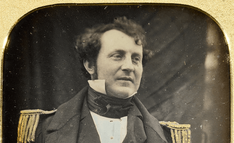 Born in 1813, Captain James Fitzjames was a senior officer onboard the HMS Erebus and the "illegitimate" son of Sir James Gambier.  