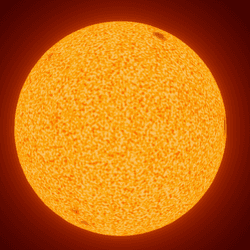 K-type stars, shown in this artistic representation, have a distinctive orange color, starspots aside.