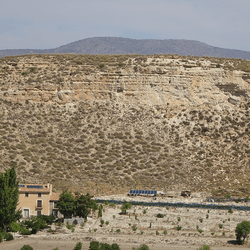 The sedimentary layers at orce, Spain, provide the opportunity to set minimum and maximum dates for the ages of hominid fossils found between, based on the magnetism encoded in those rocks.