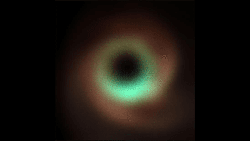 The picture show the fuzzy warped structure of light around a black hole but now it appears in different colors providing insights into the different parts.