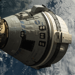 The Starliner capsule attached to the ISS.