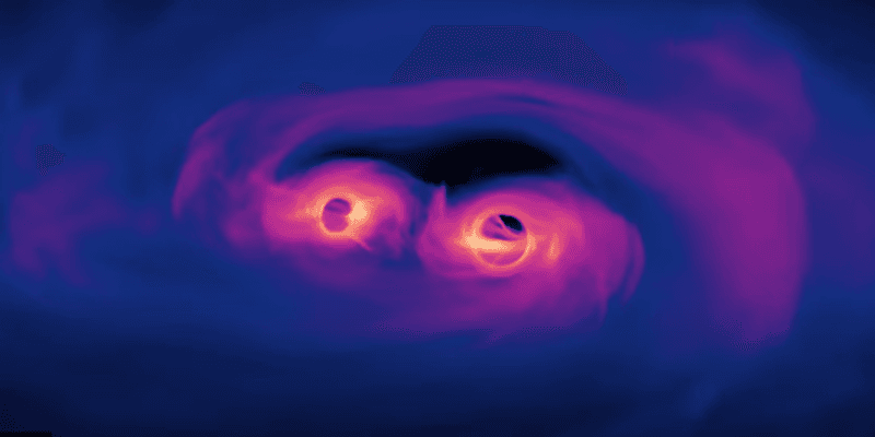 While surrounded by material it is easy for black holes to fall towards each other, but how they cross the last stretch takes some explaining, once all the nearby matter has been expelled.