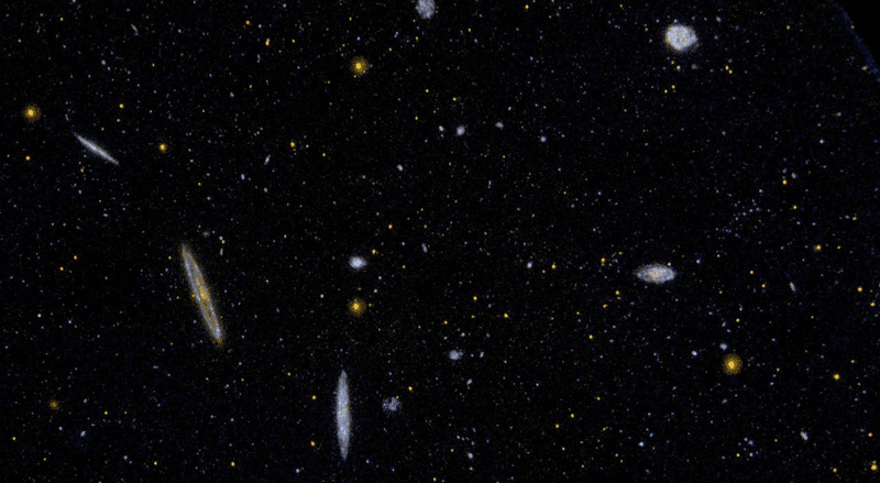 In our local region of the universe the Virgo Cluster, shown here is a sort of center, its mass distorting everything around it, but the unvierse as a whole has no center.