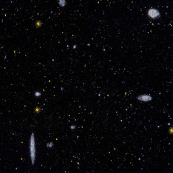 In our local region of the universe the Virgo Cluster, shown here is a sort of center, its mass distorting everything around it, but the unvierse as a whole has no center.